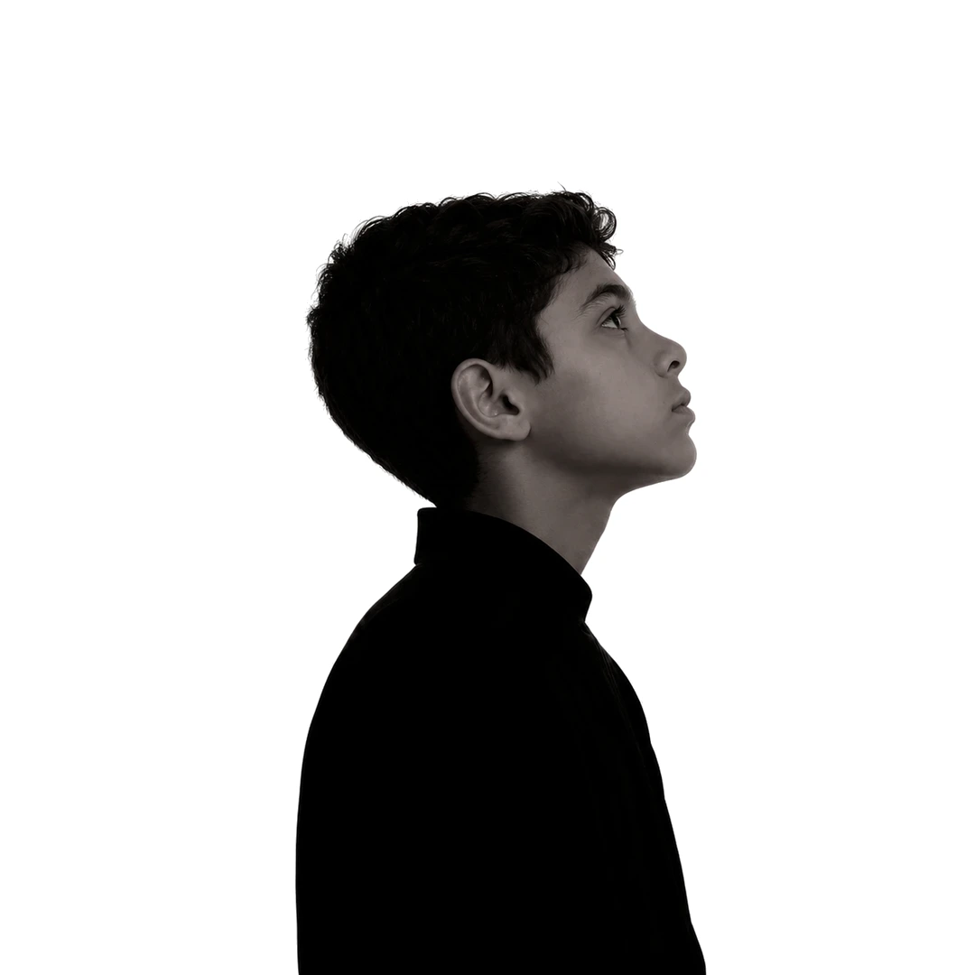 Creative agent in right-facing profile